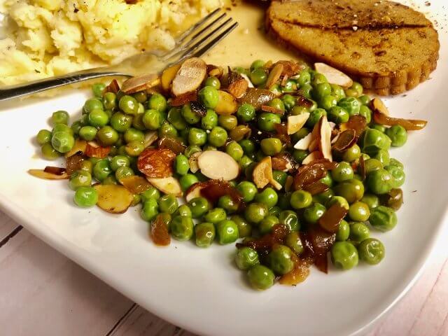 Peas and onions with toasted almonds