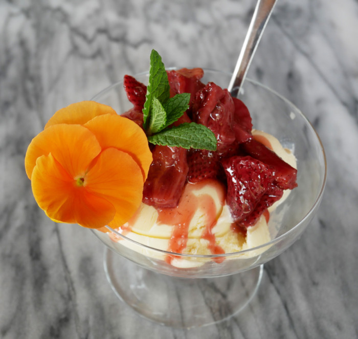 Strawberries on vanilla ice cream